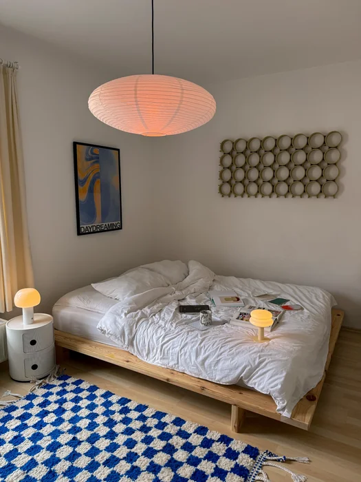 Funky Minimalist Bedroom with Blue Checkered Rug