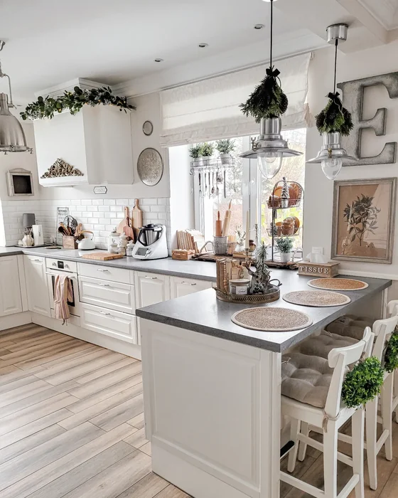 White Farmhouse Christmas Kitchen with Greenery Decor