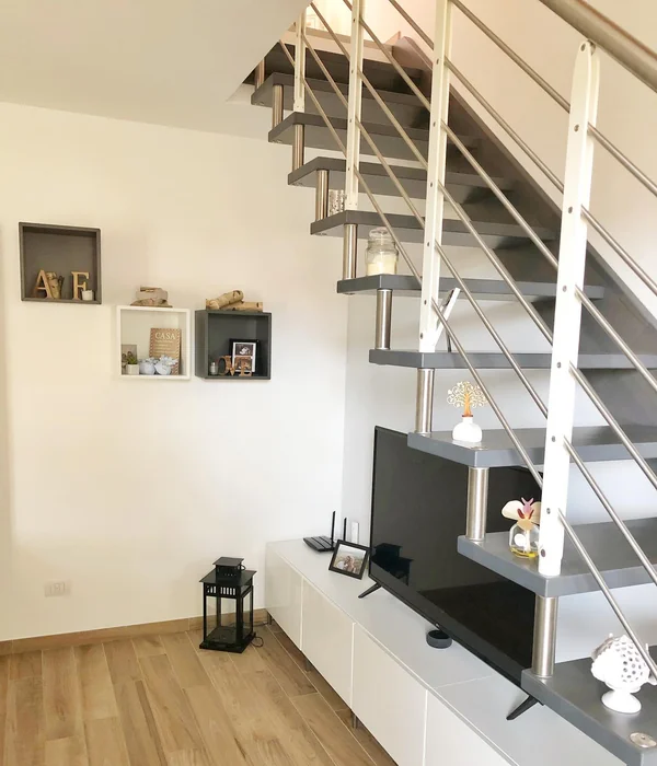 Staircase Corner with Wall-Mounted Box Shelves