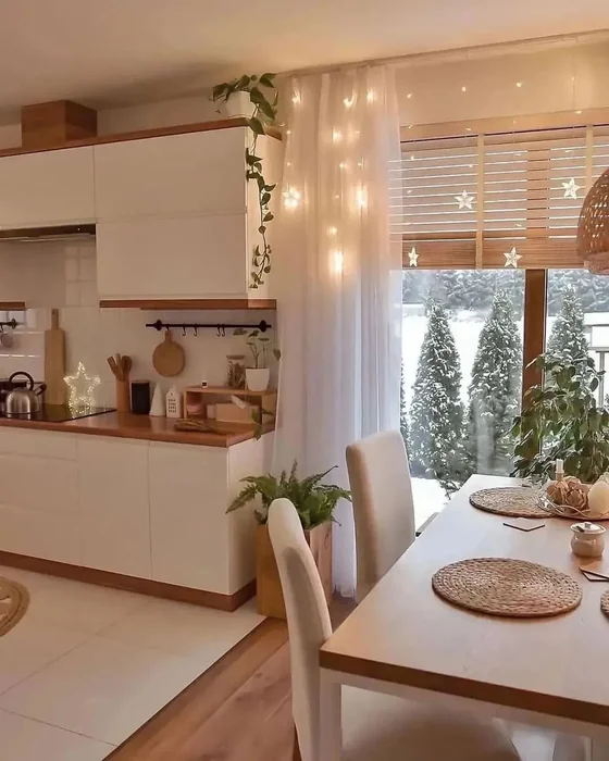 White Kitchen Table with Star Fairy Lights & Winter Christmas Decor