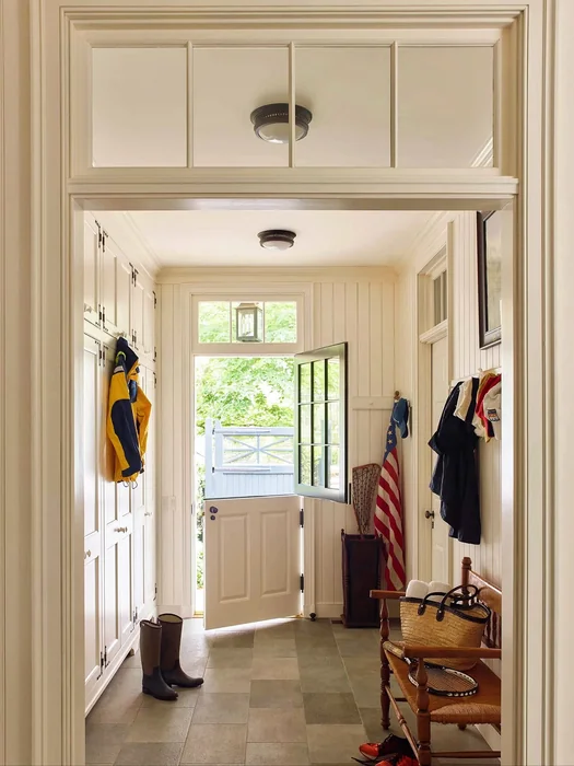 Practical Mudroom Entryway with Dutch Door and Coat Storage