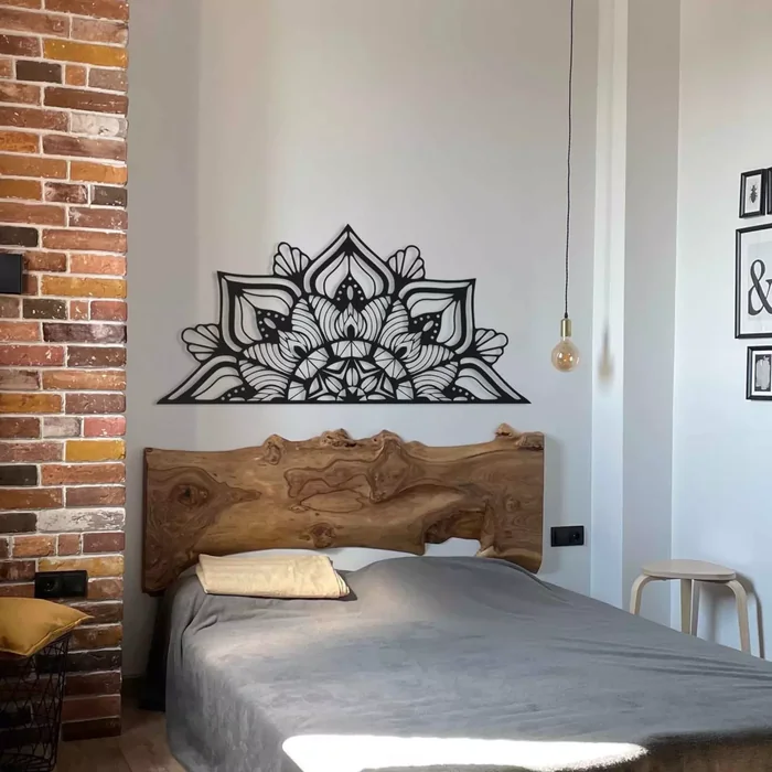 Black Metal Mandala Art Above Live-Edge Headboard