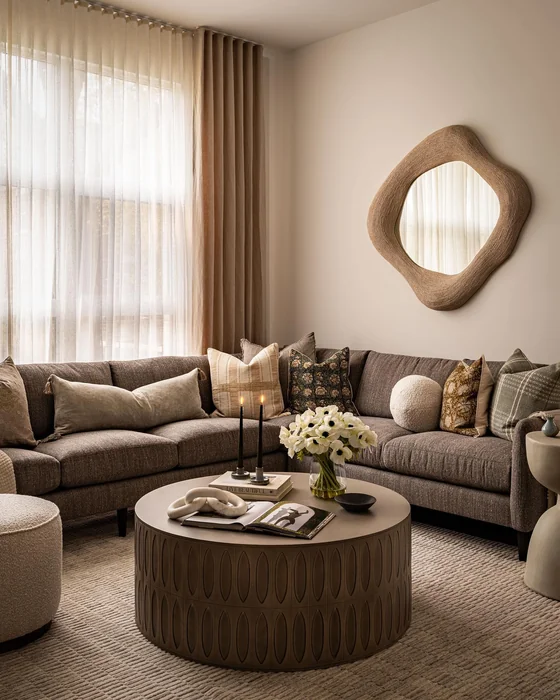 Organic Woven Mirror Wall Decor in Cozy Neutral Living Room