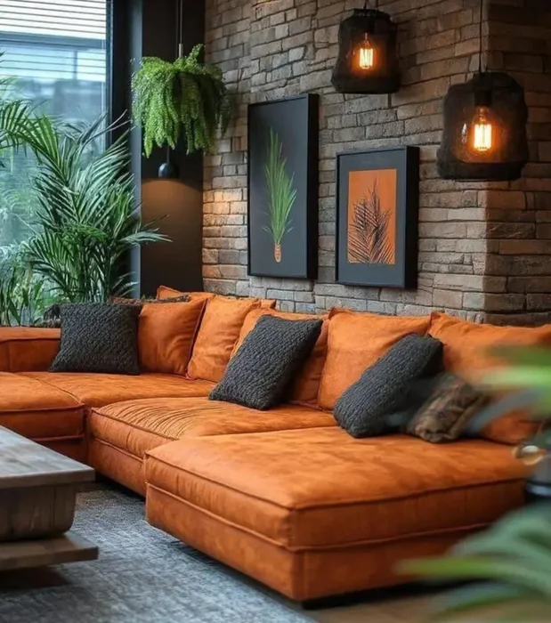 Brick Wall Living Room with Framed Botanical Art Above Couch