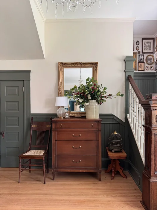 Victorian Entryway with Sage Green Wainscoting and Gold Mirror
