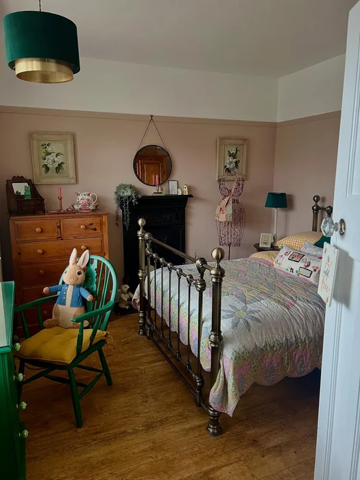 Vintage Pink Bedroom with Fireplace