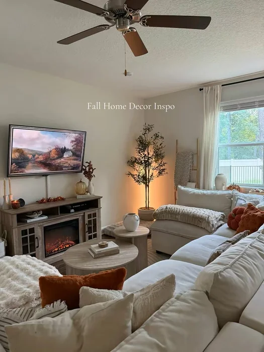 Cozy Fall Apartment Living Room with Electric Fireplace & Pumpkins