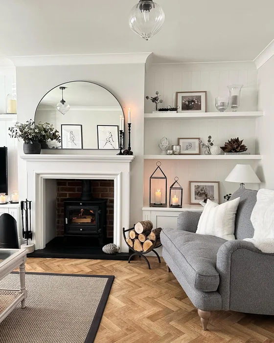 Small Living Room with Fireplace, Floating Shelves & Arched Mirror