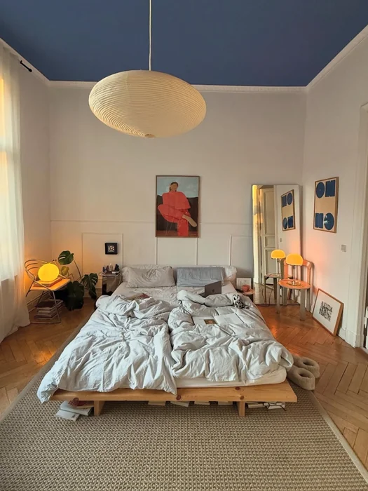 Eclectic Bedroom with Blue Painted Ceiling