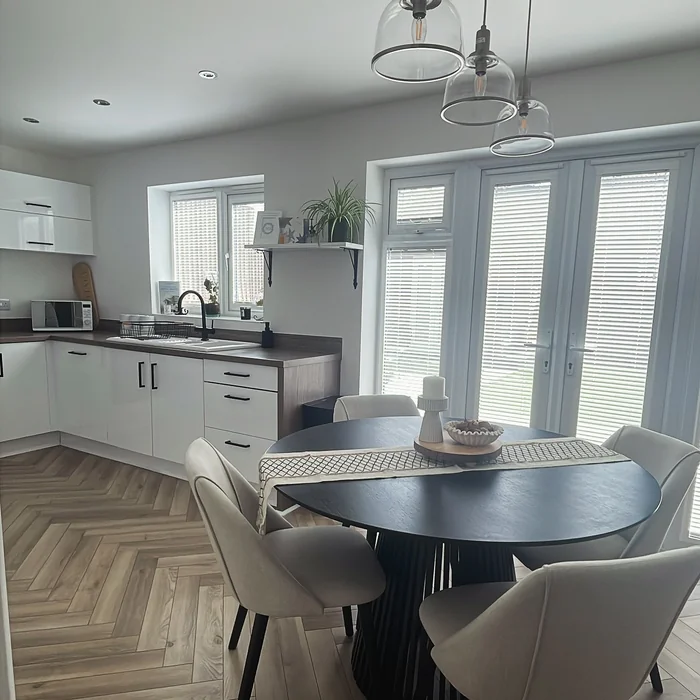 Modern Black Round Kitchen Table with Minimalist Decor