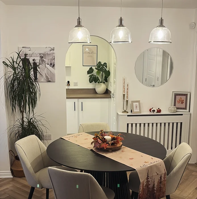 Black Round Kitchen Table with Fall Leaf Runner & Autumn Centerpiece