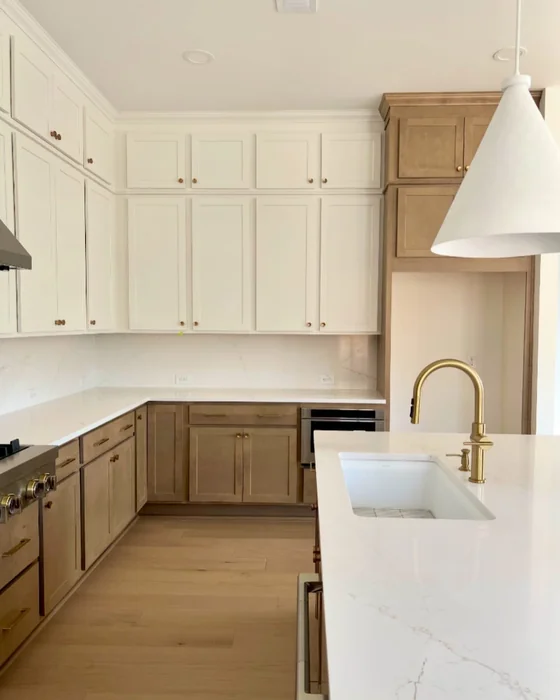 White and Wood Two-Tone Kitchen with Tall Upper Cabinets