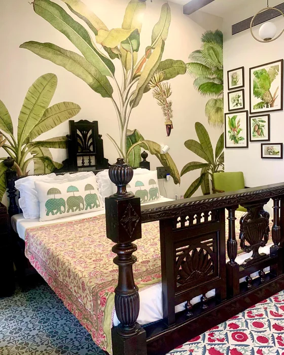 Indian Heritage Bedroom with Tropical Leaf Mural and Botanical Gallery
