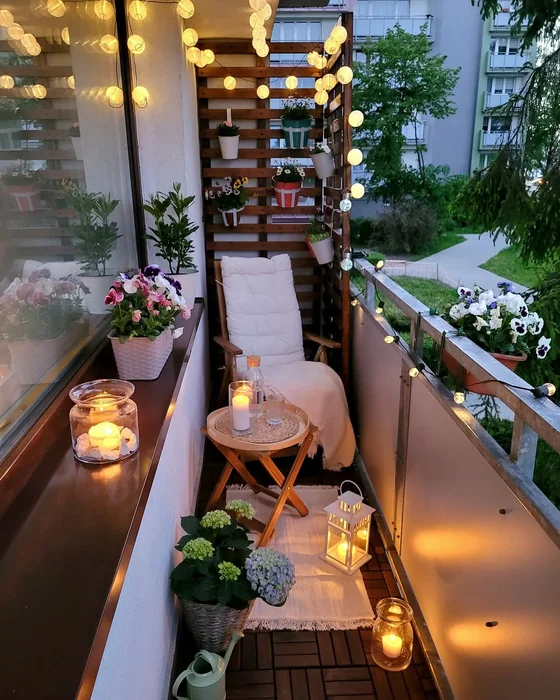 Very Narrow Balcony with Candles, Pallet Wall, and Flowers