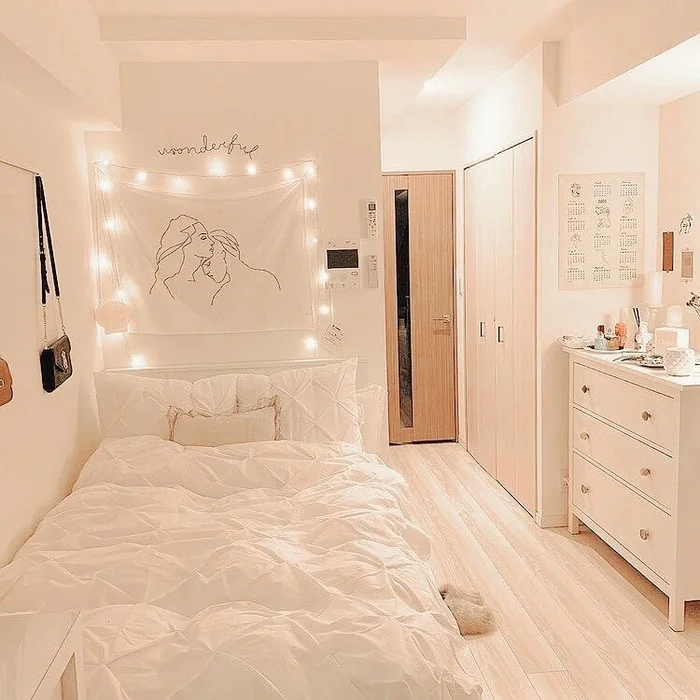 Minimalist White Dorm with Line Art Tapestry