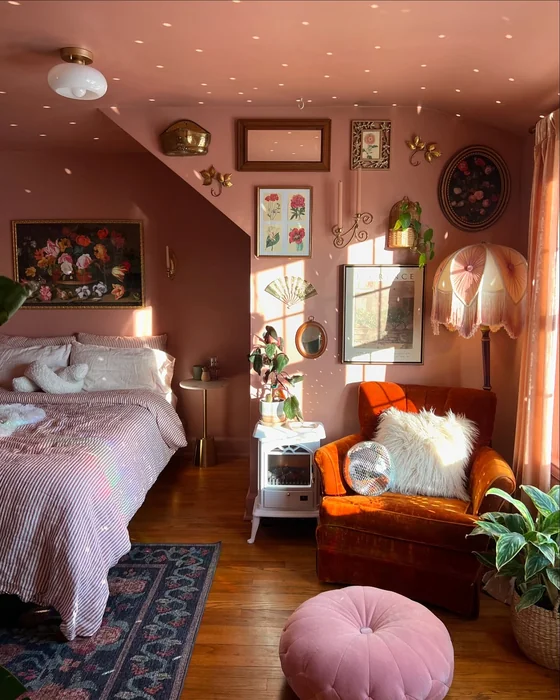 Maximalist Pink Bedroom with Eclectic Gallery Wall and Vintage Decor