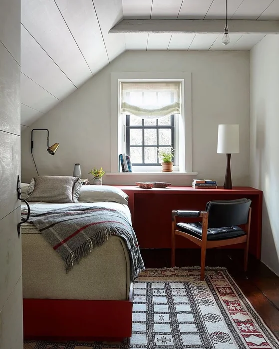 Tiny Attic Bedroom with Red Desk