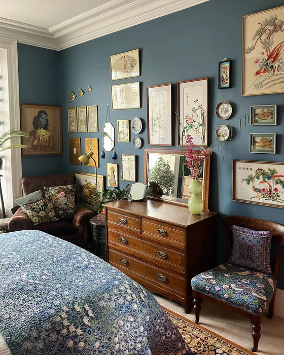 Dark Blue Bedroom with Vintage Eclectic Gallery Wall