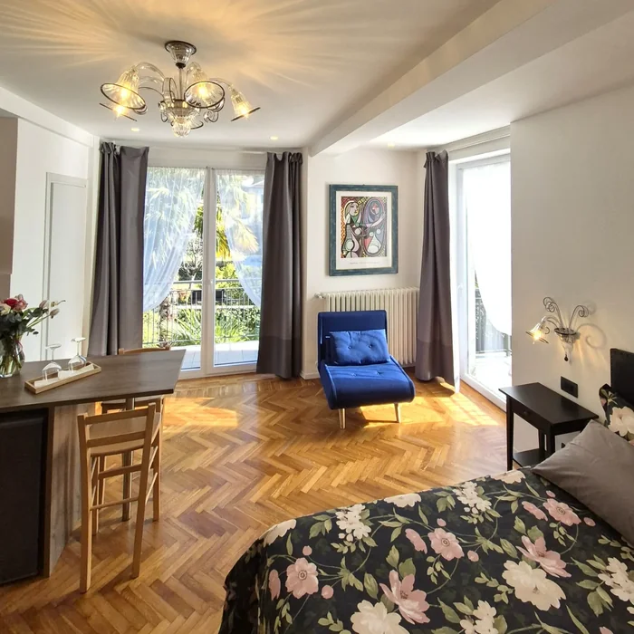 European Studio Airbnb with Art & Herringbone Floor
