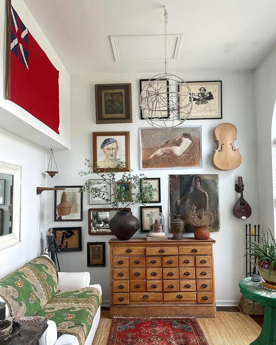 Eclectic Small Room Gallery Wall with Vintage Art