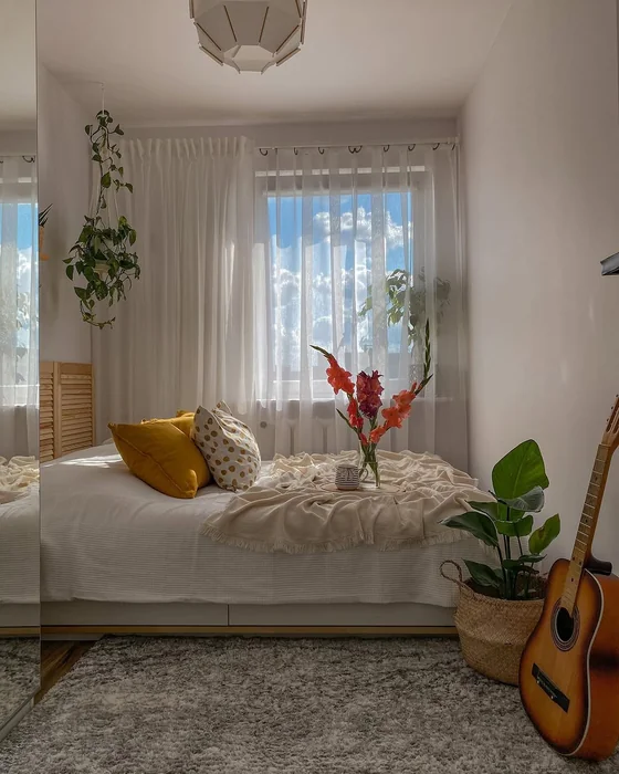 Bright Small Bedroom with Flowers