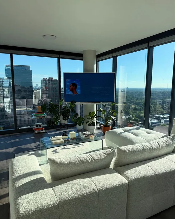 Modern White High-Rise Apartment with Panoramic City Views