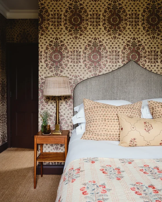 Vintage Maximalist Bedroom with Ornate Patterned Wallpaper