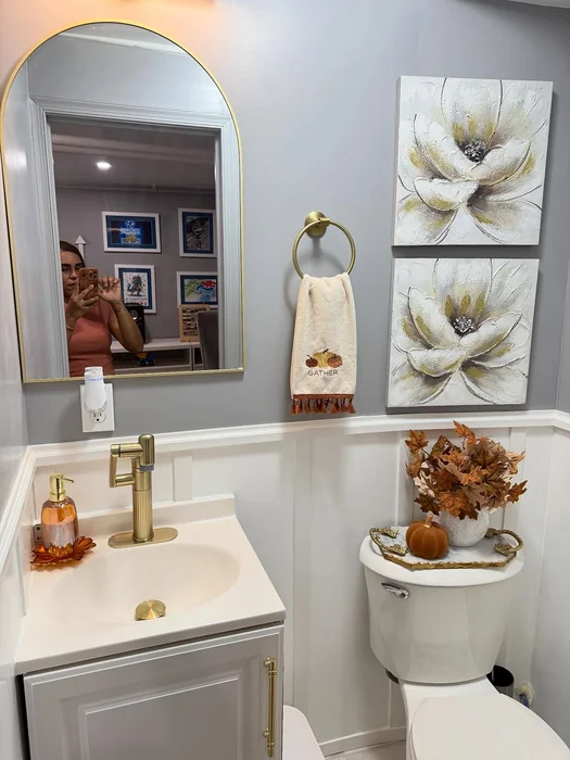 Small Fall Half Bathroom with Gold Accents