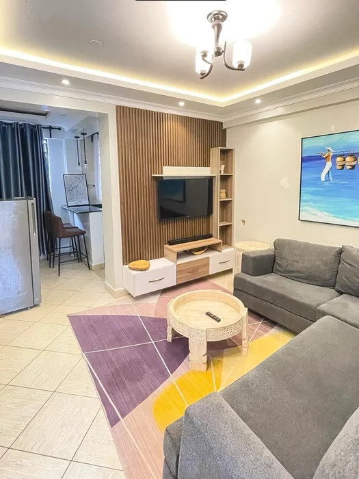 Modern Airbnb Living Room with Slat Wall TV Unit