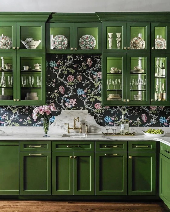 Dramatic Floral Wallpaper Behind Green Kitchen Cabinets